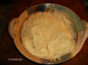 Kunafa bottom layer of dough in pottery